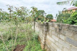 Fenced Plot for Sale in Kyanja Town – 20 Decimals (100ft x 90ft)