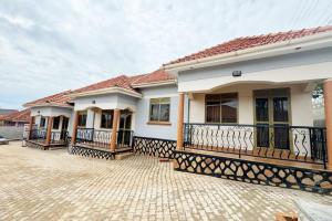 Rental Project for Sale in Najjera Town – 3 Semi-Detached Homes
